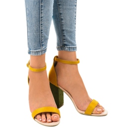 Yellow and green sandals on a post with a buckle 0280-135 1