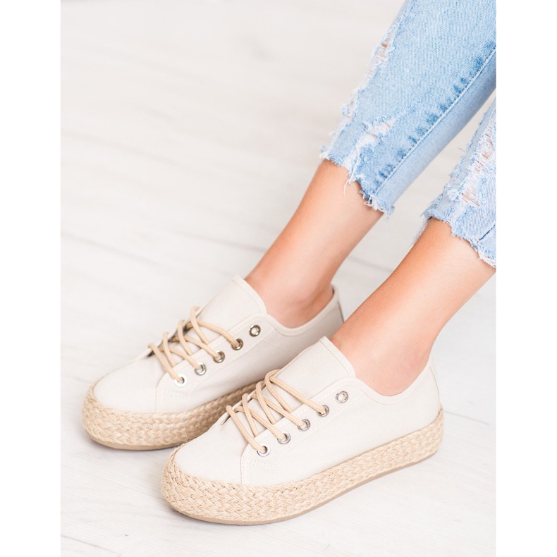 Kylie Sneakers On A Straw Platform brown 1