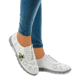 White openwork sneakers with the imprint JH81171-1 1