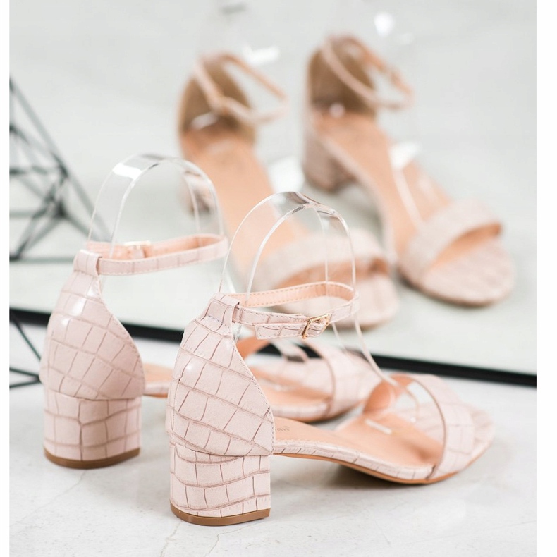 Small Swan Comfortable sandals on a low post beige 1