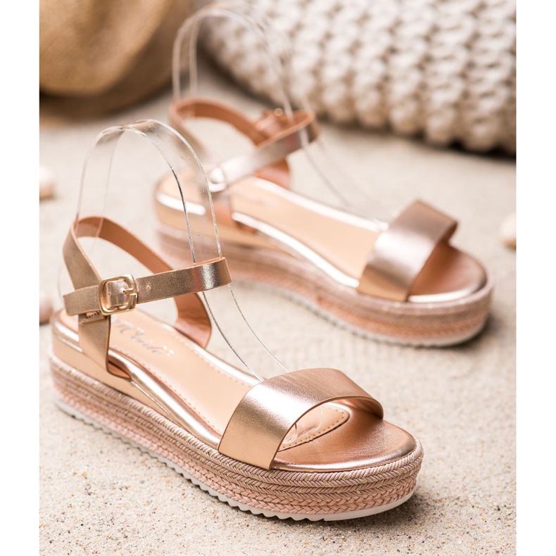 Weide Golden Sandals With Ornate Platform 1