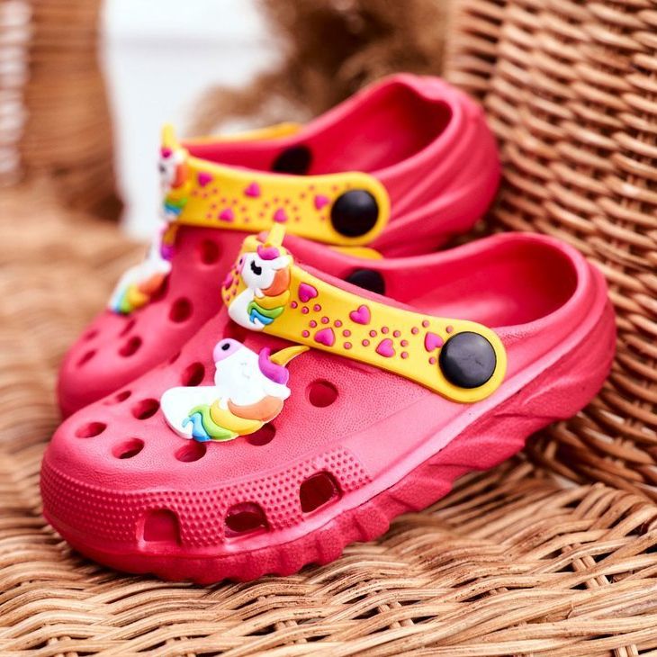 Yellow and pink crocs sales
