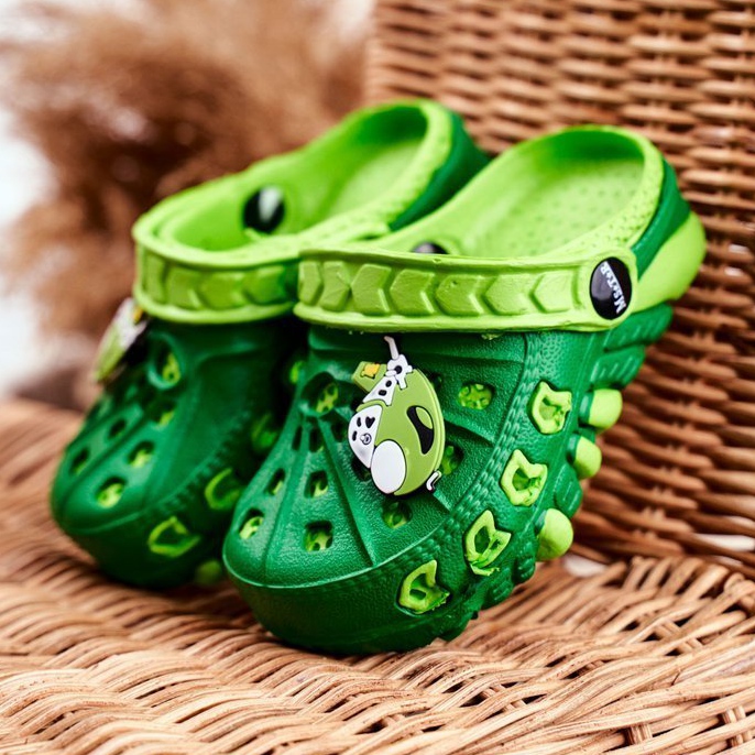 Green kids crocs deals