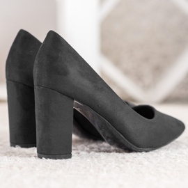 Small Swan Black Pumps On A Pillar 1