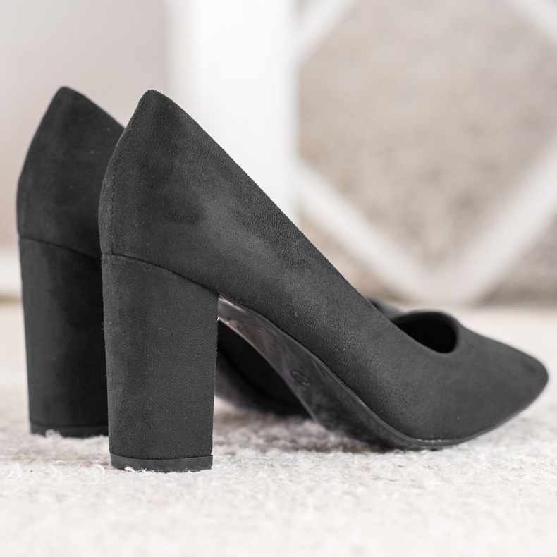 Small Swan Black Pumps On A Pillar 1