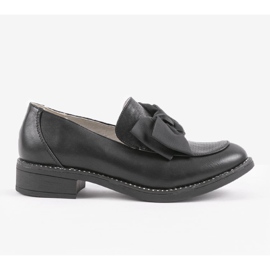 Black slip-on shoes with a RS-WED2 bow 1