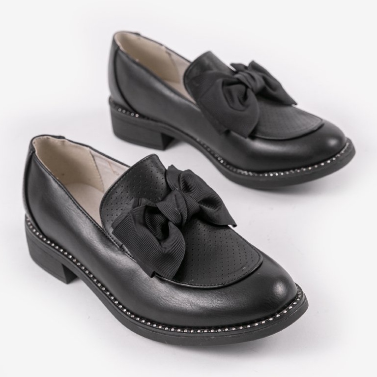 Black slip-on shoes with a RS-WED2 bow 2