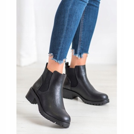 J. Star Slip-on boots on a post black 2