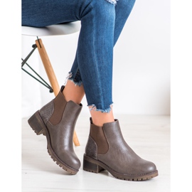 J. Star Slip-on boots on a post brown 1