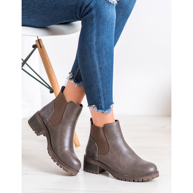 J. Star Slip-on boots on a post brown 1