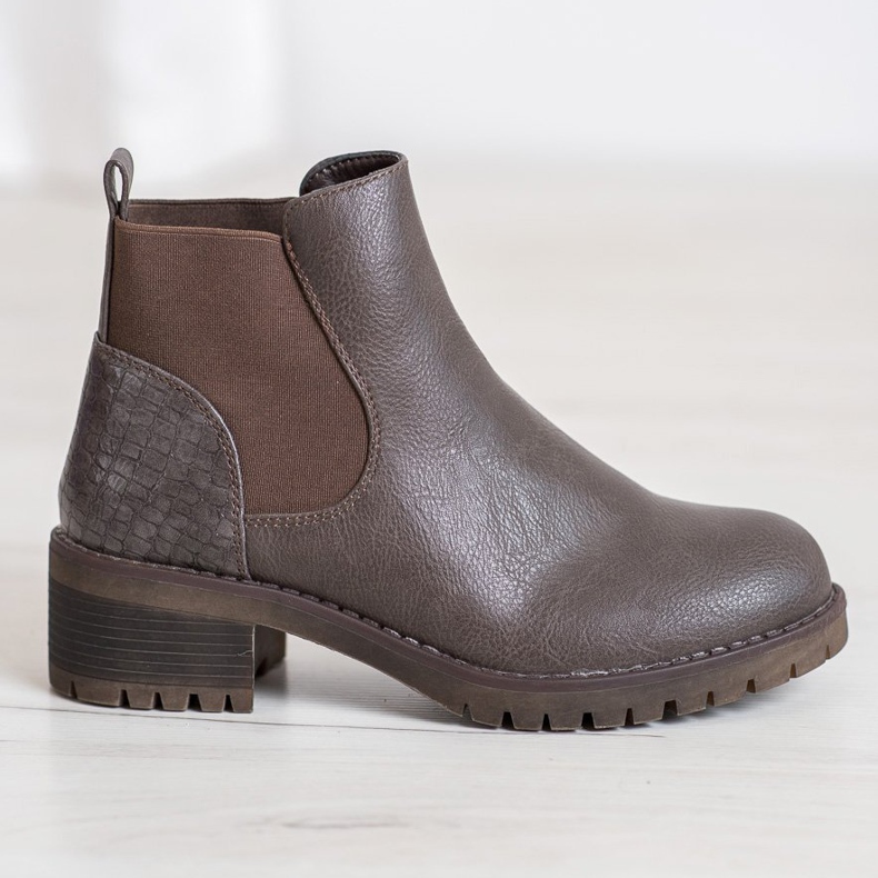J. Star Slip-on boots on a post brown 2