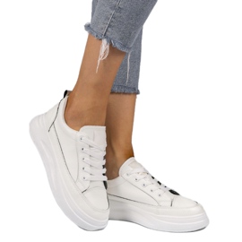 White sneakers on a higher R50 sole black 1