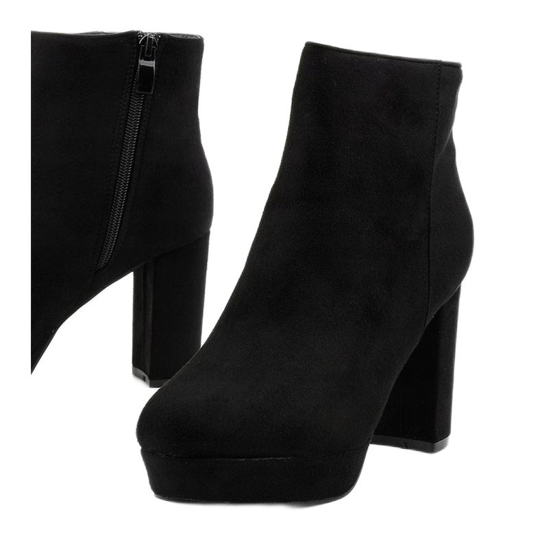 Black ankle boots on the Neadarea post 1