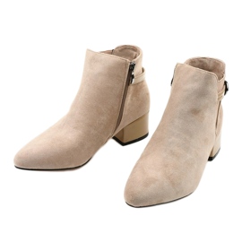 Beige boots with a small post of Brizaris 2