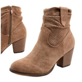 Khaki suede ankle boots on the Delalise post 1