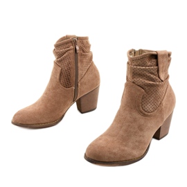 Khaki suede ankle boots on the Delalise post 2