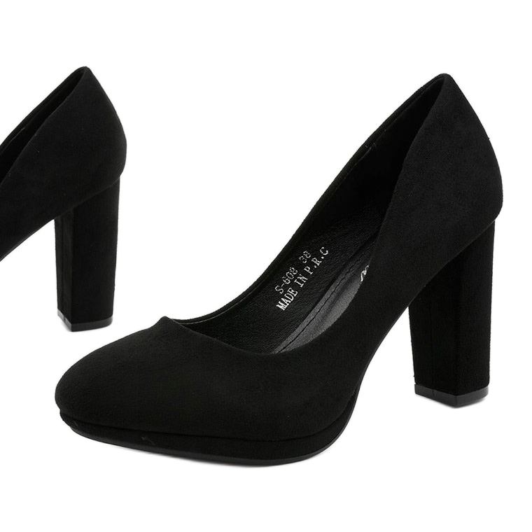 Black suede pumps on the Recite post 1