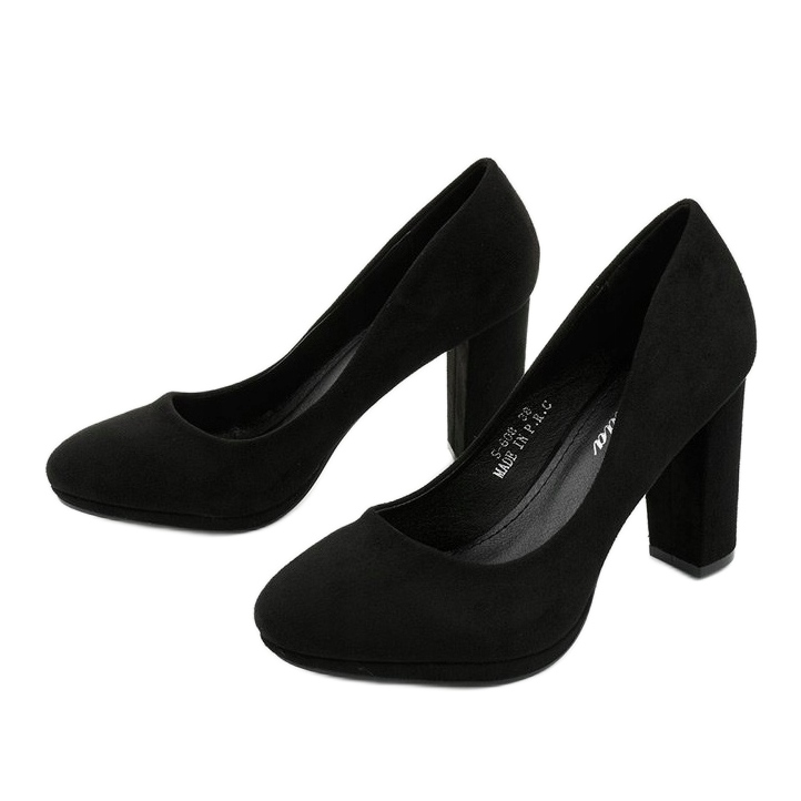 Black suede pumps on the Recite post 2