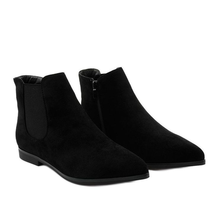 Black flat ankle boots from Myron 2