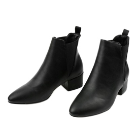 Black ankle boots on a post with a Lucency elastic 2