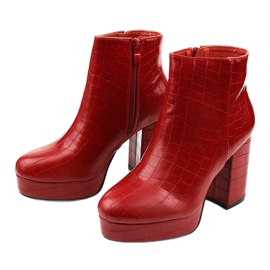 Red ankle boots on the post of Usinaya 2