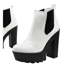 White ankle boots on the Zellola post 1