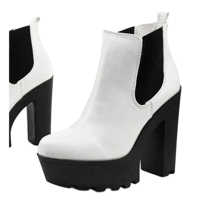 White ankle boots on the Zellola post 1