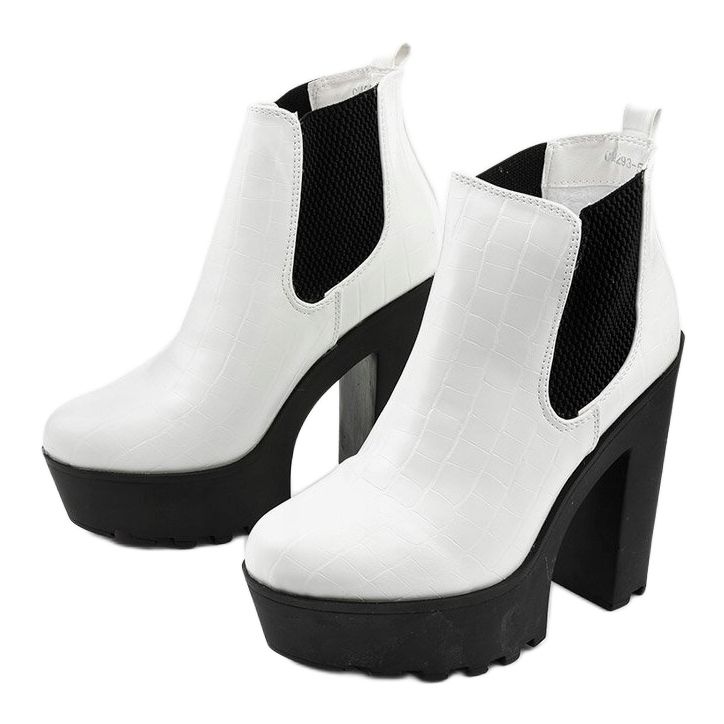 White ankle boots on the Zellola post 2