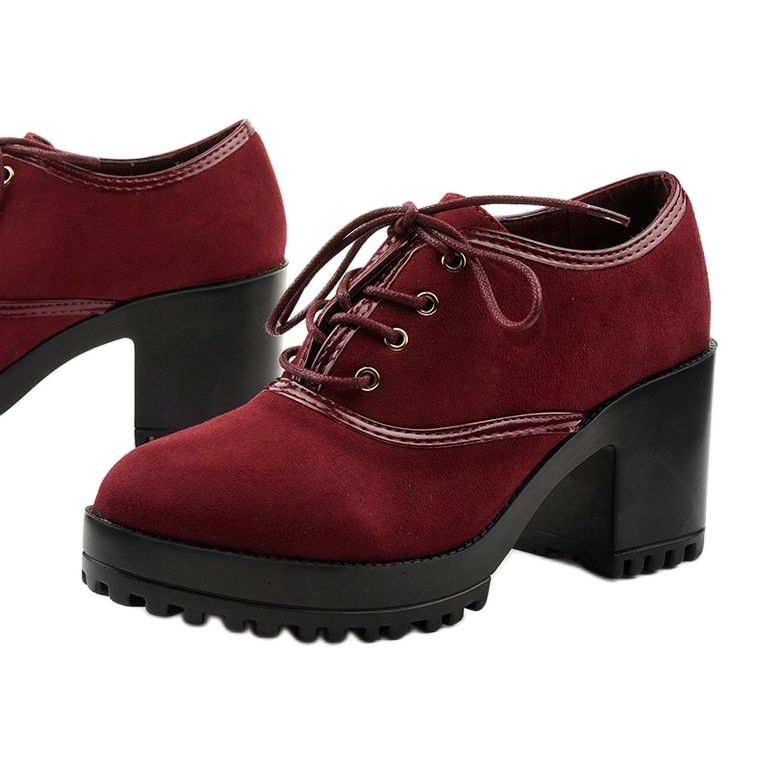 Maroon boots laced on a Clearfall block red 1