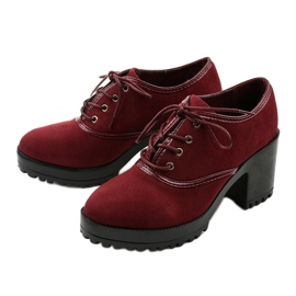 Maroon boots laced on a Clearfall block red 2