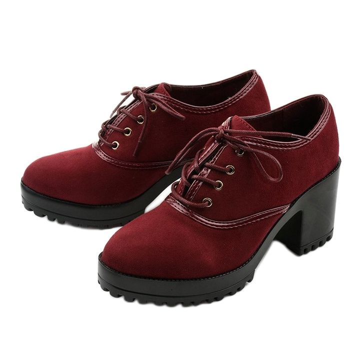 Maroon boots laced on a Clearfall block red 2