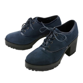 Navy blue ankle boots laced on a Clearfall block 2