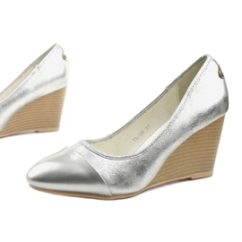 Silver pumps on the Bluehorn wedge heel 1