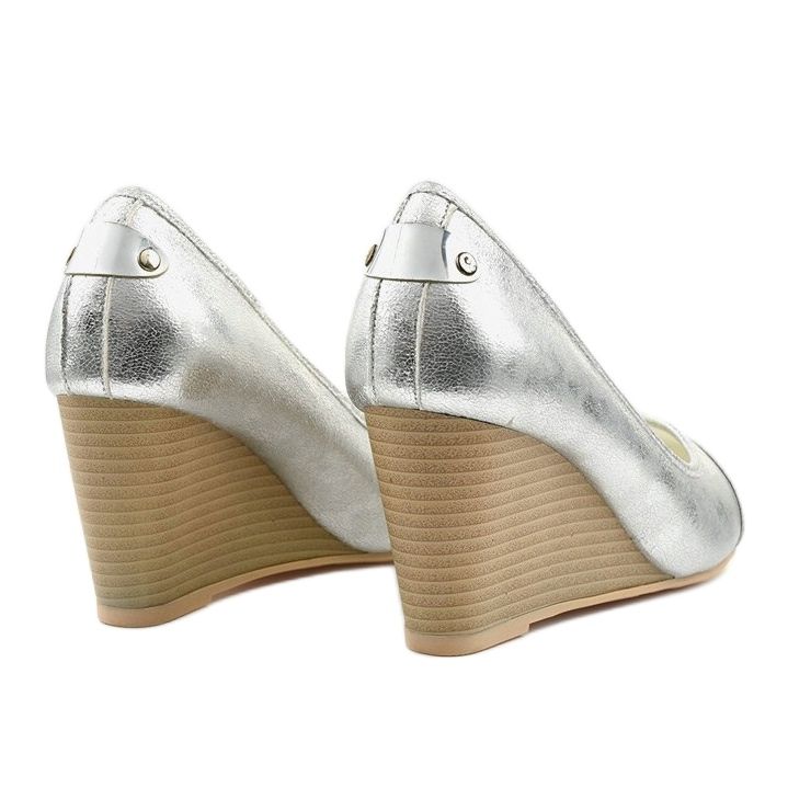 Silver pumps on the Bluehorn wedge heel 2