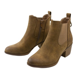 Khaki suede ankle boots on the Tarrenscribe post green 2