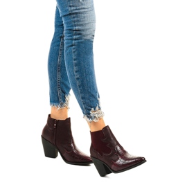 Maroon boots on the post of Harriet cowboy boots red 1