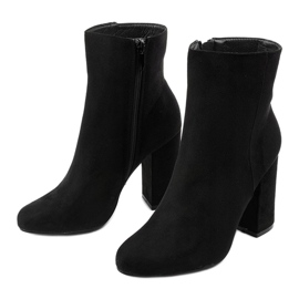 Black suede ankle boots on the Wenonah post 2