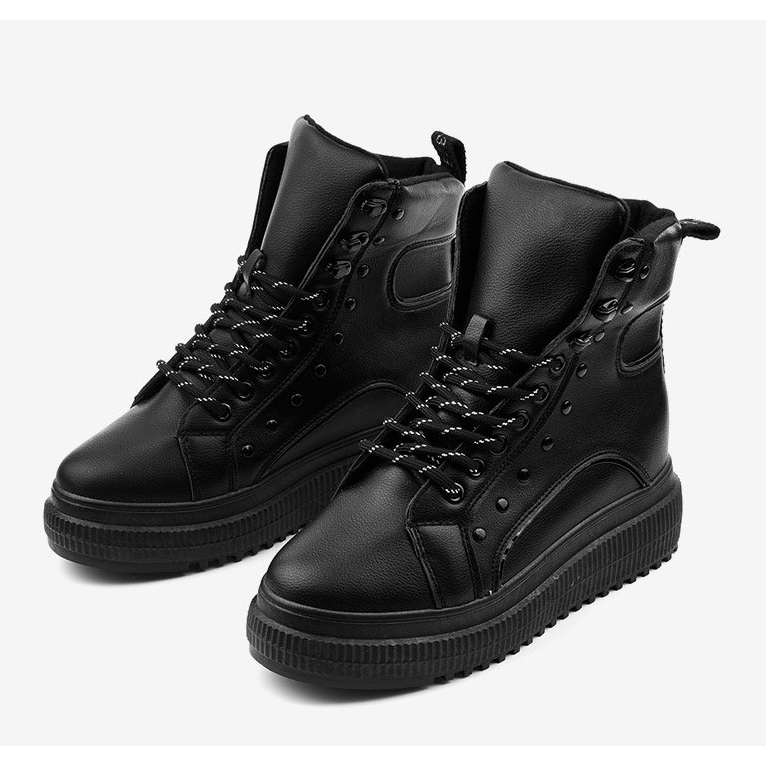 Black sports boots on the Aethireisis platform 2