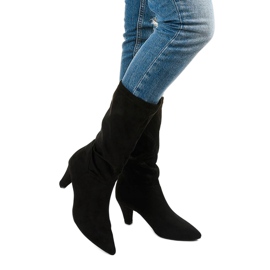 Black boots on a thick Fourmane heel 1
