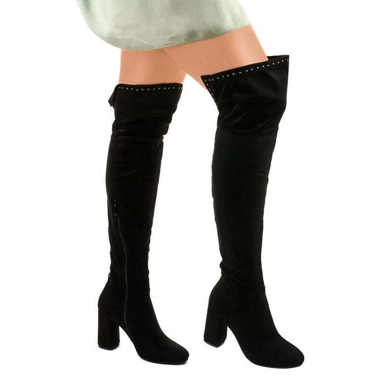 Black, insulated boots with an Infrared jets upper 1