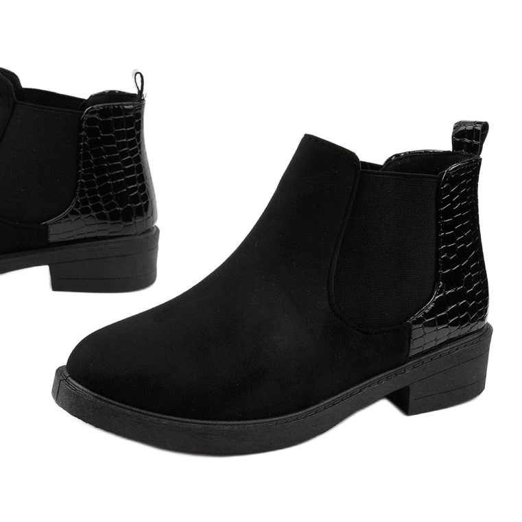 Black suede flat boots from Herkrana 1