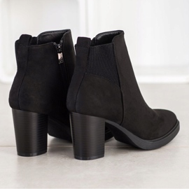 Super Mode Black Booties On A Post 1