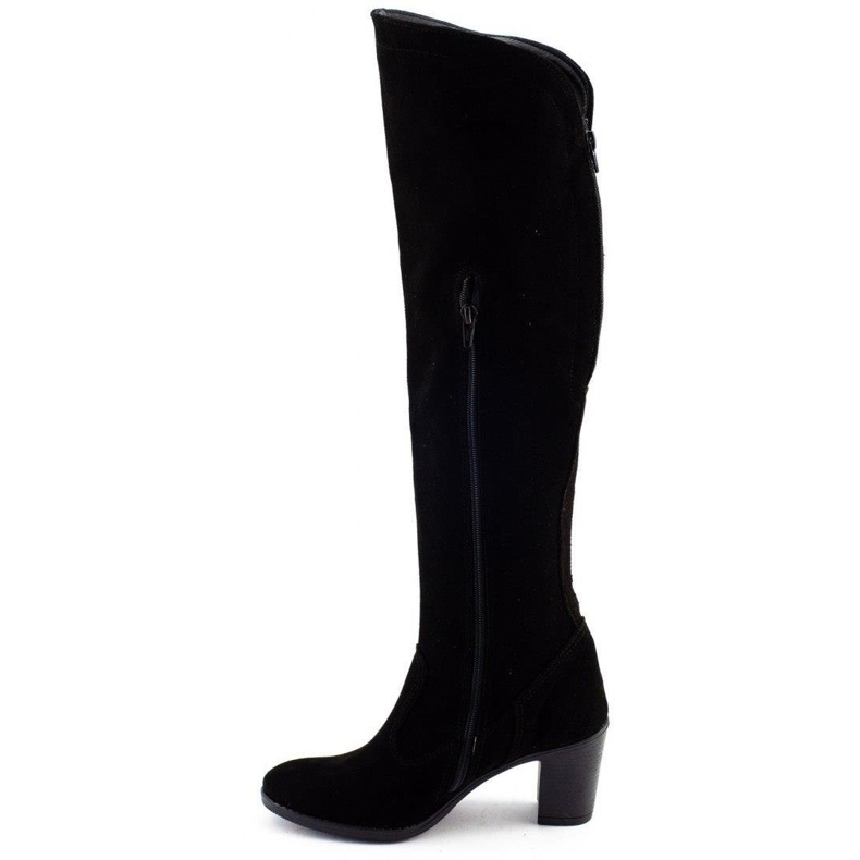 Olivier Agnes insulated boots on a black post 1