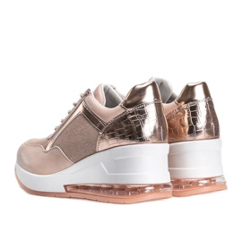 Pink gold sneakers on the Jimena wedge 2