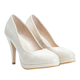 Beige eco-leather pumps on the Liana platform 1