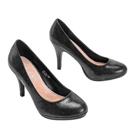 Black shiny pumps on the Arely platform 1