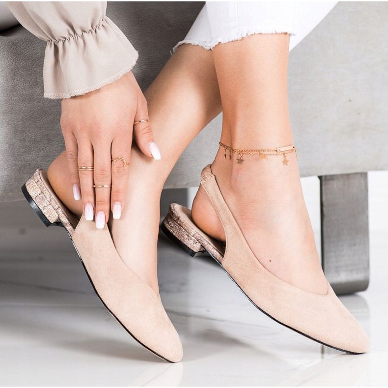 Goodin Slip-on pumps with an exposed heel beige 1