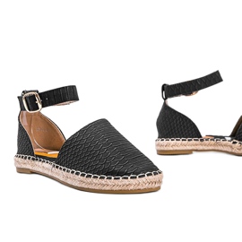Black espadrilles with a snakeskin motif 1
