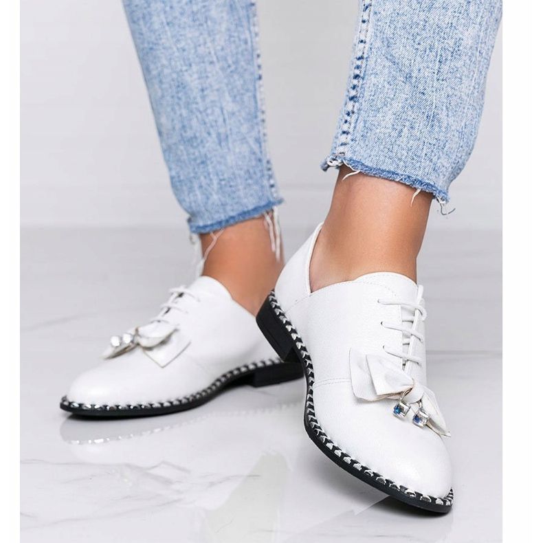 White shiny shoes with a Lost Stars bow 1