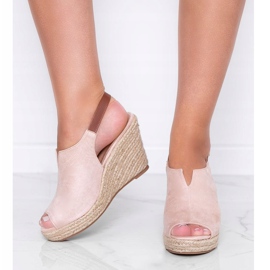 Beige wedge sandals by Lindy 1